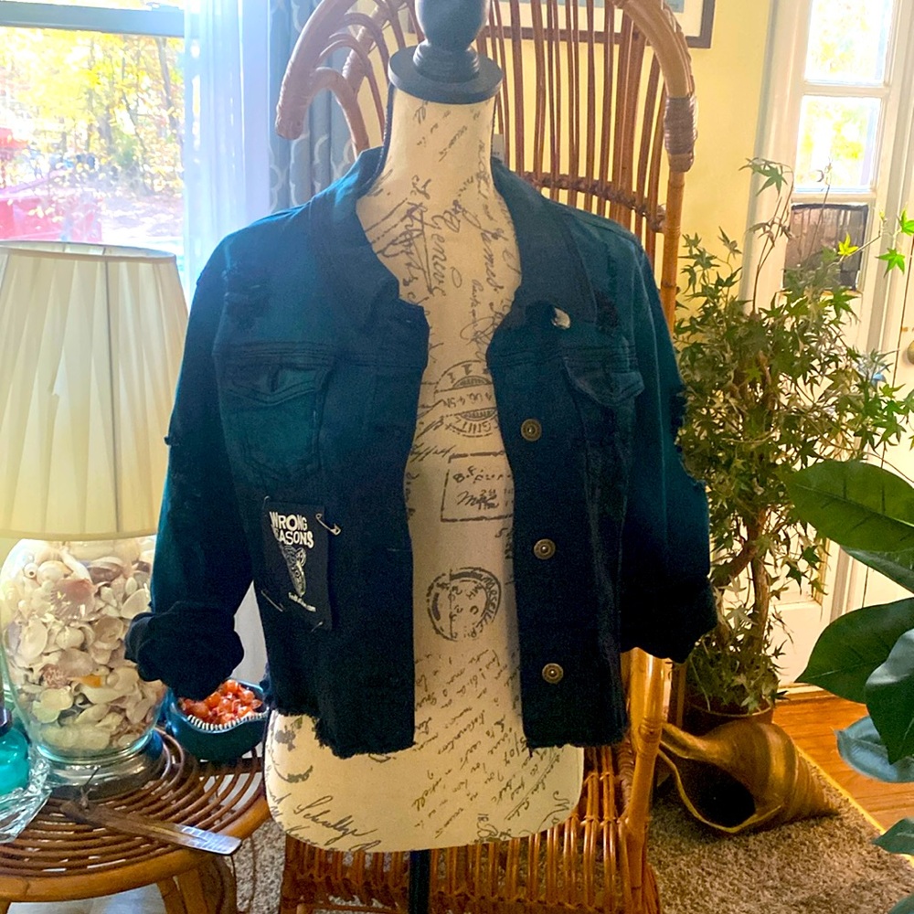 Black and teal faded and distressed denim jacket